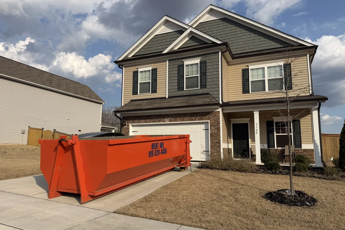 Waste On Wheels dumpster at a home in Johnston County, NC